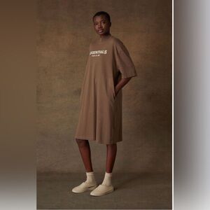 Fear of God Essentials women’s T-shirt Dress in color Oak . Size small. Pockets